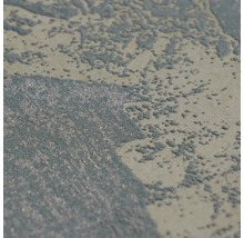 Close-up van een gestructureerd behang met onregelmatig patroon