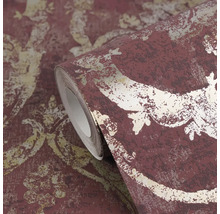 Behangrol met damastpatroon, vliesbehang in vintage stijl, rood en goud met een gestructureerd oppervlak.