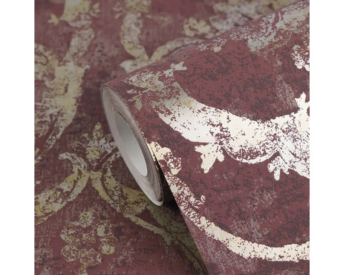 Behangrol met damastpatroon, vliesbehang in vintage stijl, rood en goud met een gestructureerd oppervlak.