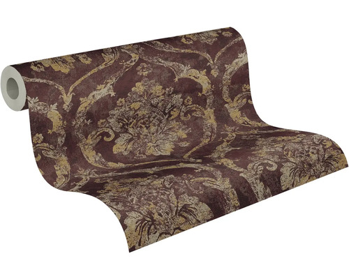 Vliesbehang met barok damastpatroon in bordeauxrood en goud.