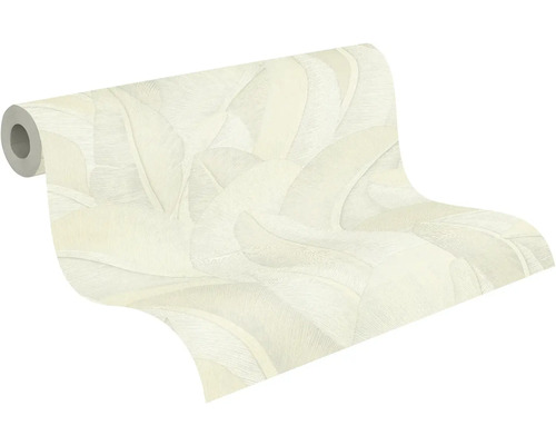 Vliesbehang met groot bladerpatroon op een rol.