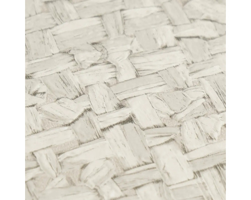 Detailopname van licht behang met vlechtlook en gestructureerd oppervlak.