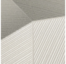 Close-up van gestructureerd vliesbehang met een geometrisch patroon van lijnen en een ribbelstructuur.