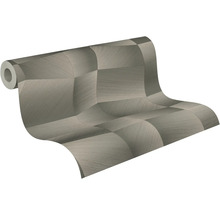 Behangrol met driedimensionaal geometrisch patroon in grijs, gestructureerde metallic look.