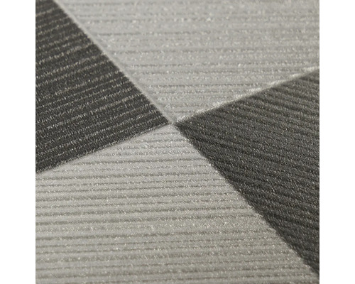 Close-up van een gestructureerd behang met geometrisch patroon