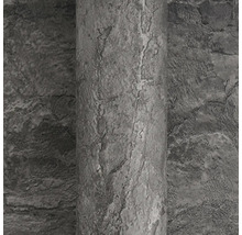 Grijs vliesbehang met steenlook en gestructureerd oppervlak.