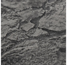 Gestructureerd oppervlak van vliesbehang met steenlook.