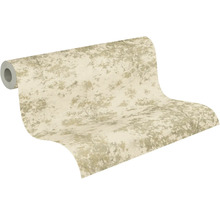 Vliesbehang met abstract boom- en natuurpatroon, gedeeltelijk uitgerold.