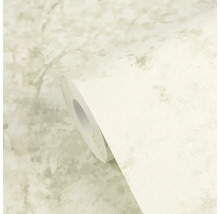 Vliesbehang in betonlook met gestructureerd oppervlak in lichte tinten op rol.