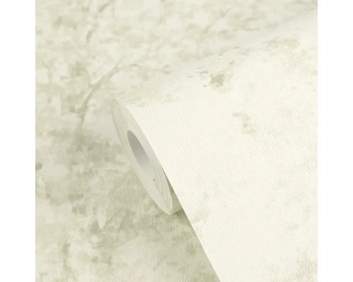 Vliesbehang in betonlook met gestructureerd oppervlak in lichte tinten op rol.