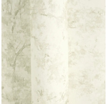 Lichte vliesbehang met gemarmerde structuur en subtiel patroon voor wandafwerking.