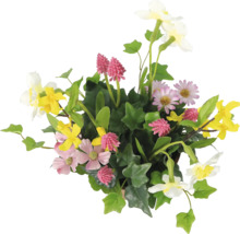 Bloemstuk met diverse bloemen en groene bladeren