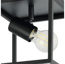 Detailopname van een zwarte plafondlamp met gloeilamp