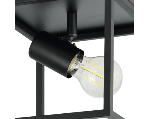 Detailopname van een zwarte plafondlamp met gloeilamp