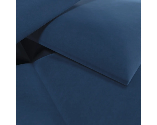 Detailweergave van een blauwe meubelstof met een zachte textuur.