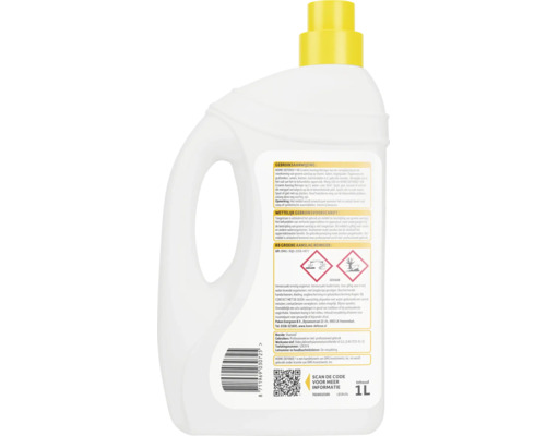 Achterkant van een 1 liter fles KB Groene Aanslag Reiniger met gebruiksaanwijzing, gevarensymbolen en barcode.