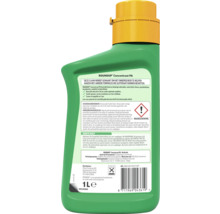 Achterzijde van een fles Roundup Concentraat PA onkruidverdelger met gebruiksaanwijzing en waarschuwingssymbool voor gezondheidsrisico's.