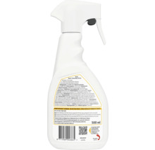 Achterzijde van een 500 milliliter Home Defense spuitfles tegen honden en katten, met productetiket en ingrediënten.