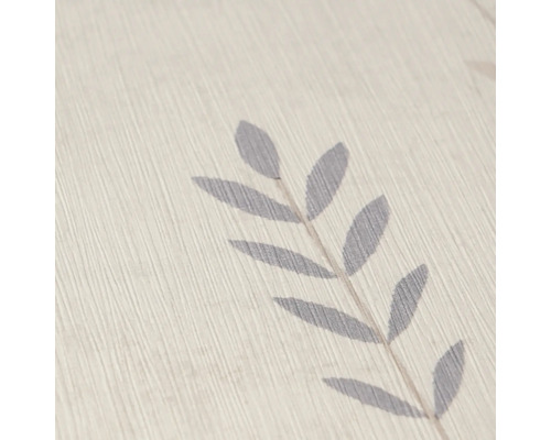 Detailweergave van gestructureerd behang met bladpatroon.