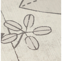 Detailopname van een gestructureerd oppervlak met een gestileerd bladpatroon en lijntekening.