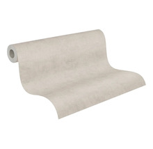 Rol behang met een subtiele stucwerkstructuur in lichtbeige.