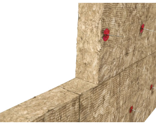 Minerale wol isolatieplaten gemonteerd op een muur met isolatiepluggen.