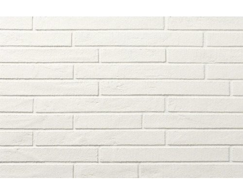 Steenstrips in witte baksteenlook met een gestructureerd oppervlak voor wandbekleding.