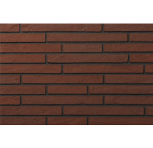 Steenstrips in slank langformaat met een gestructureerd oppervlak en donkere voegen.