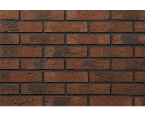 Steenstrips in steenlook met een gestructureerd oppervlak en donkere voegen.