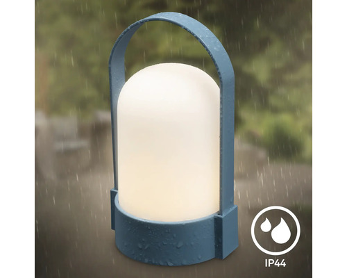 Draagbare LED-buitenlamp in blauw met handvat en wit lichtelement, spatwaterdicht volgens IP44 voor gebruik buitenshuis.