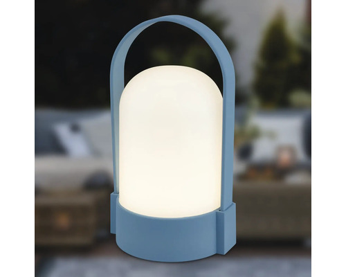 Blauwe draagbare LED-buitenlamp met witte ronde kap en handvat.