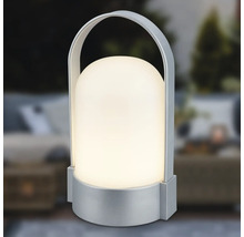 Draagbare LED-tafellamp met zilverkleurige voet en beugelgreep, koepelvormige kap, warmwit licht.