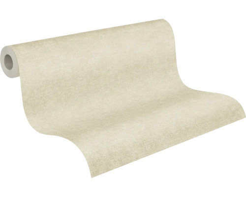 Gestructureerd vliesbehang in beige, effen kleur, gedeeltelijk uitgerold.