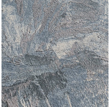 Gestructureerd behang met steen- en betonlook in grijs en blauw.