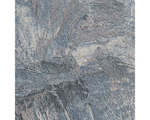 Gestructureerd behang met steen- en betonlook in grijs en blauw.