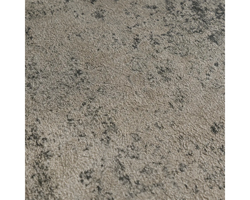 Vliesbehang met gestructureerd oppervlak in steenlook in grijs en beige.