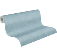 Vliesbehang met fijne structuur in blauw voor wandafwerking.