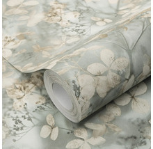 Vliesbehang op rol met floraal patroon van bladeren en bloemen in vintage stijl, toont de oppervlaktestructuur.