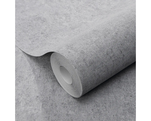 Gestructureerd behang met betonlook op een rol.
