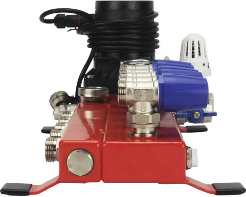 Compact regelstation voor vloerverwarming met circulatiepomp, rode verdelers en blauwe stelmotoren.