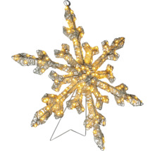 Verlichte kerstboompiek in de vorm van een sneeuwvlok met warme lichtjes en zilveren glinsterende netstructuur.