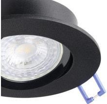 Ronde LED inbouwspot van metaal in zwart met gestructureerde lens en montageveer.