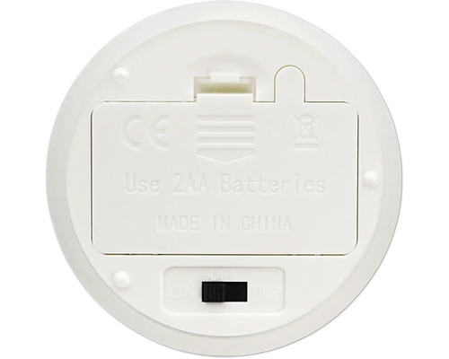 Onderkant van een elektronisch apparaat met batterijvak voor twee AA batterijen en een schakelaar met aan uit en timerfunctie.