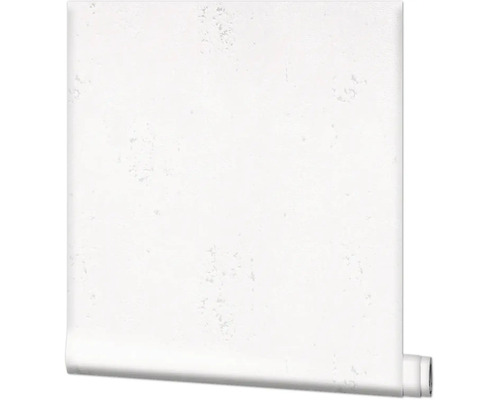 Wit vliesbehang met een gestructureerde steen- of pleisterlook.