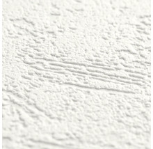 Detailopname van wit gestructureerd behang met een grove korrel en onregelmatige oppervlaktestructuur.
