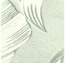 Close-up van de textuur van vliesbehang met organisch bladpatroon.