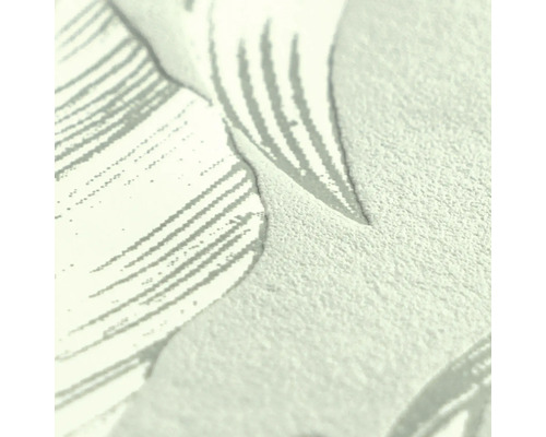 Close-up van de textuur van vliesbehang met organisch bladpatroon.