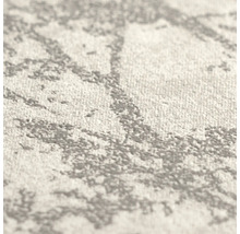 Detailopname van vliesbehang met grijs en wit abstract patroon en voelbare oppervlaktestructuur.