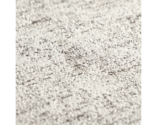 Detailopname van gestructureerd behang met pleisterwerk-effect.