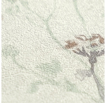 Detailopname van gestructureerd behang met bloemenpatroon en reliëf.